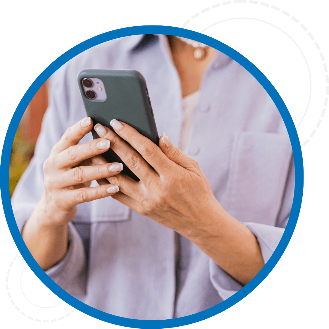 Close up of hands holding a cell phone to log into the Servall customer log in to view statements, payment history and more