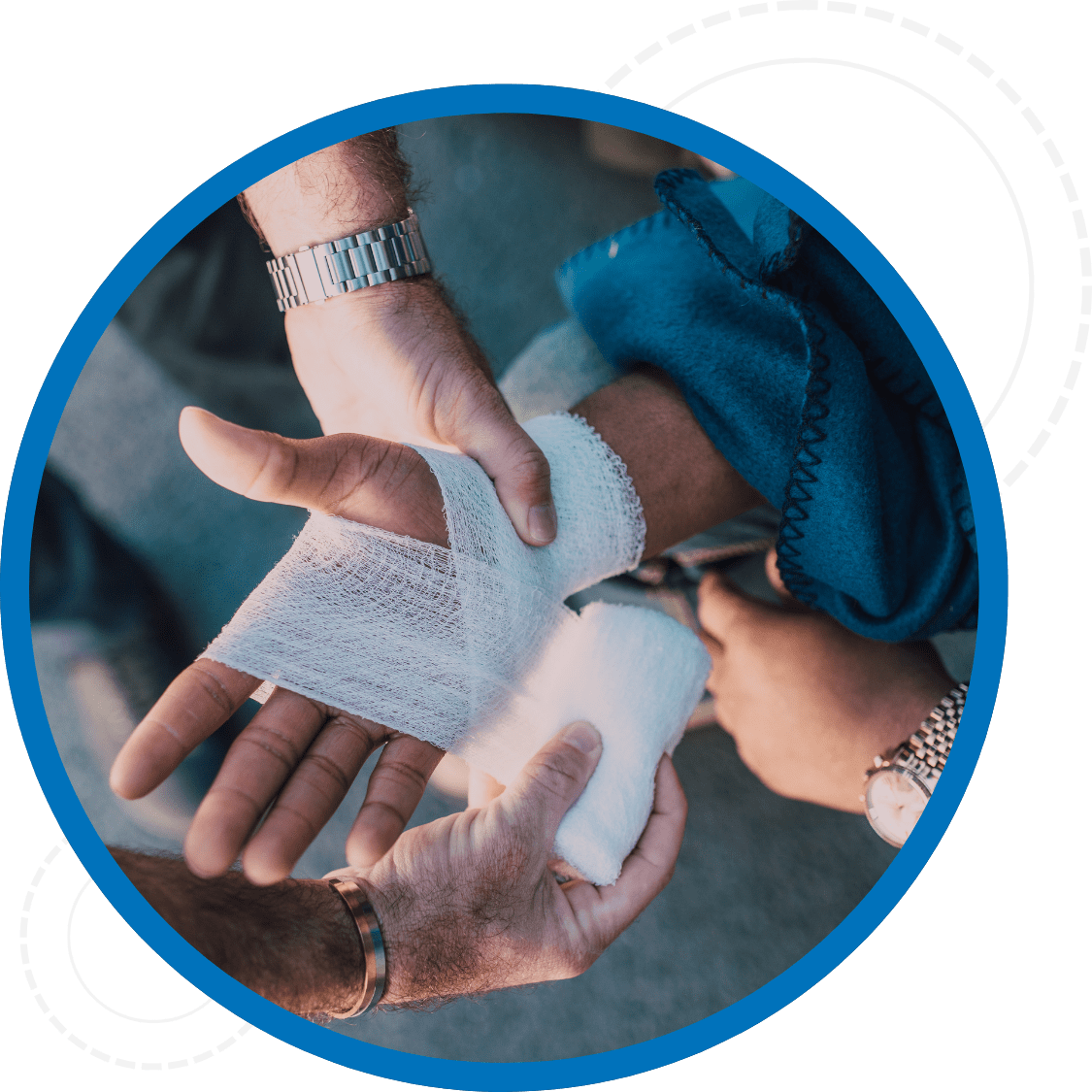 Close up of hands using first aid supplies and wrapping another hand in gause
