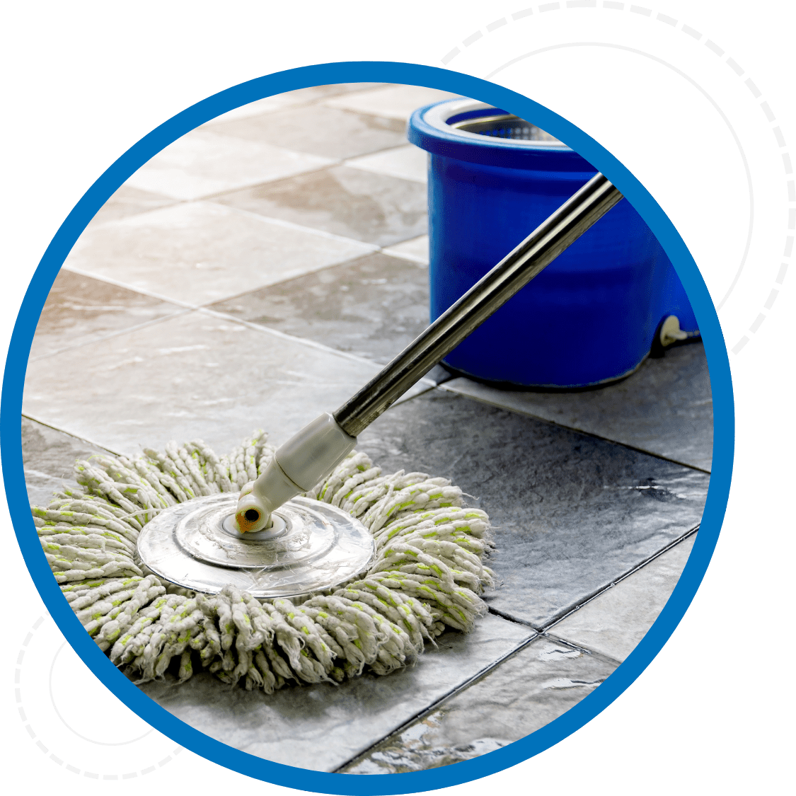 Close up of a mop and bucket being used to clean tile